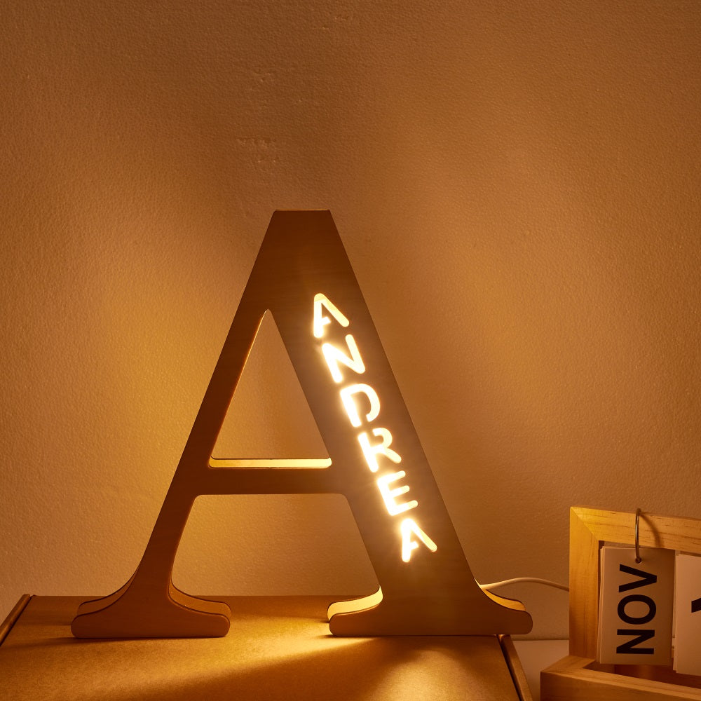 Personalized wooden letter night light with the name "ANDREA" illuminated in warm LED, 28CM high, a unique home decor.