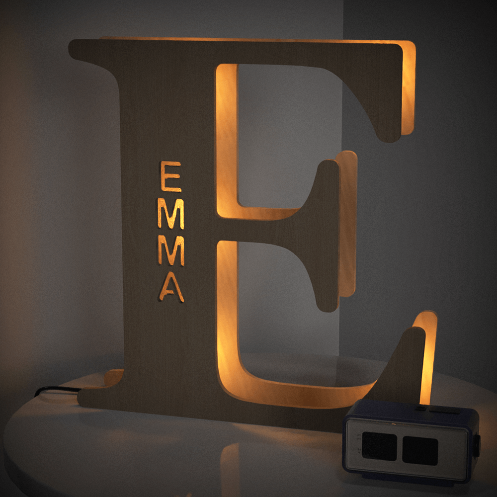 Personalized wooden letter 'E' night light with the name 'EMMA' illuminated, 28cm tall, warm LED glow, home decor.