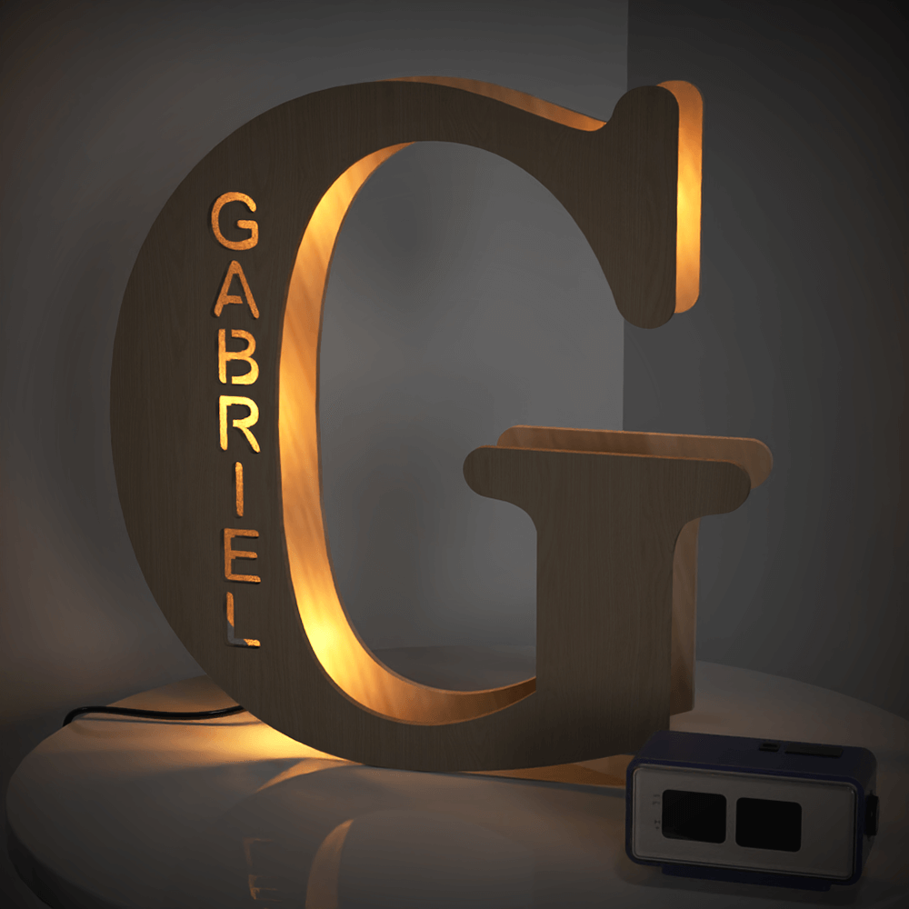 Personalized wooden letter 'G' night light with 'GABRIEL' name, warm LED glow, 28CM home decor.