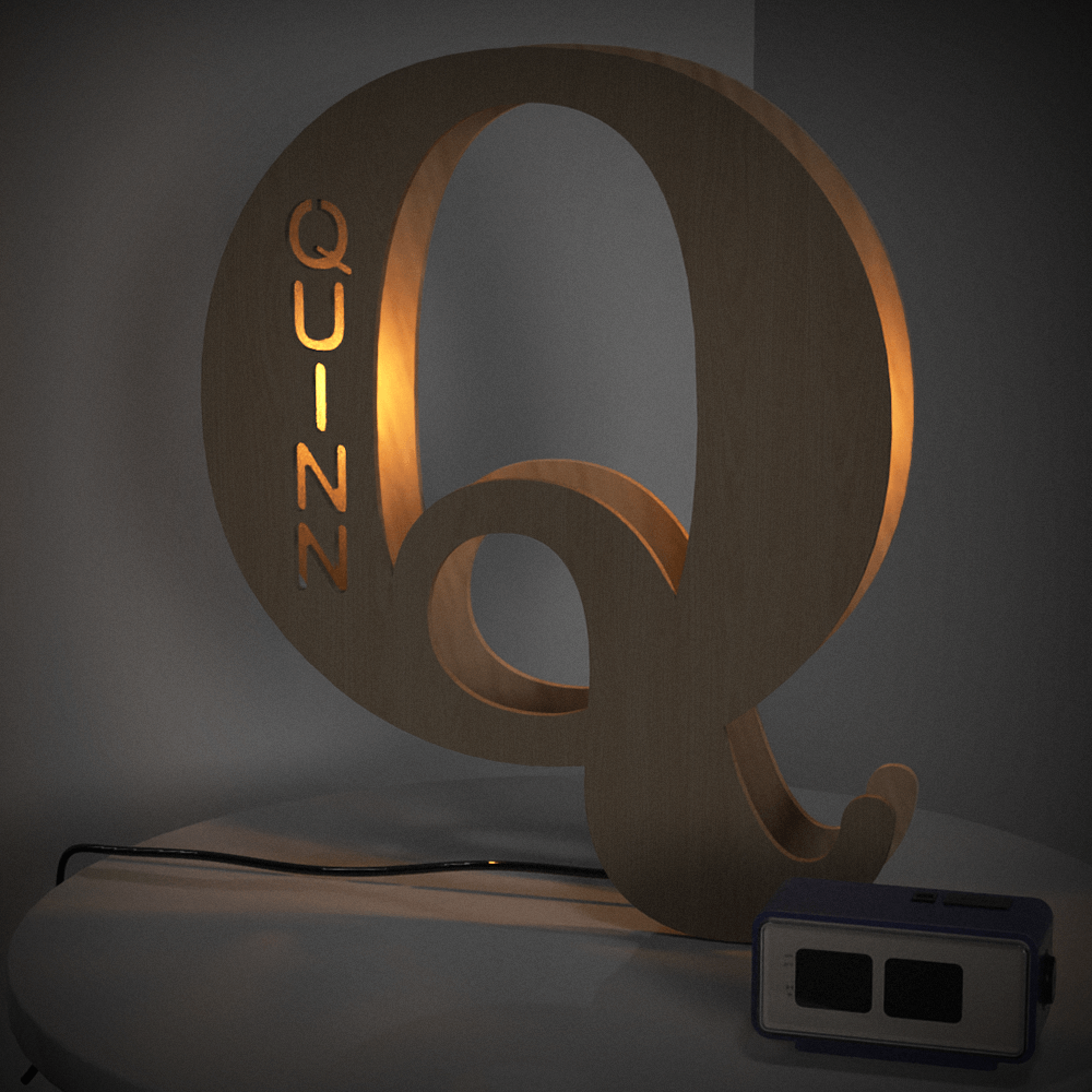 Personalized wooden letter 'Q' night light with 'QUIZZ' name, warm LED glow, 28cm home decor.