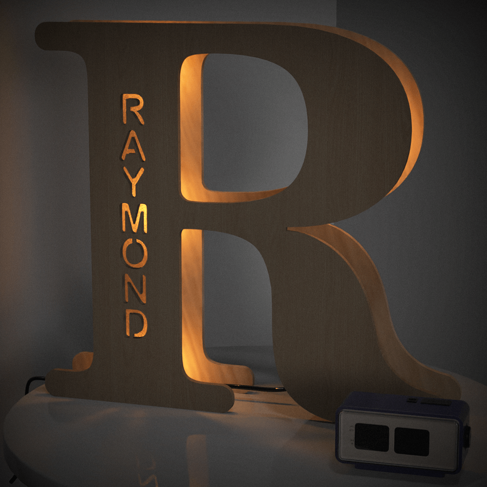 Personalized 'R' wooden night light with 'RAYMOND' name, emitting warm LED glow, 28cm home decor.