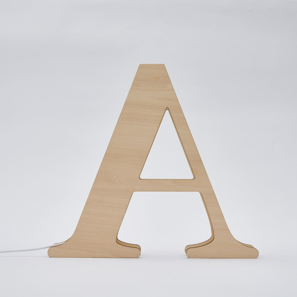 Wooden letter 'A' night light, 28cm tall, unlit, for home decor. Featuring laser-cut design and USB port.